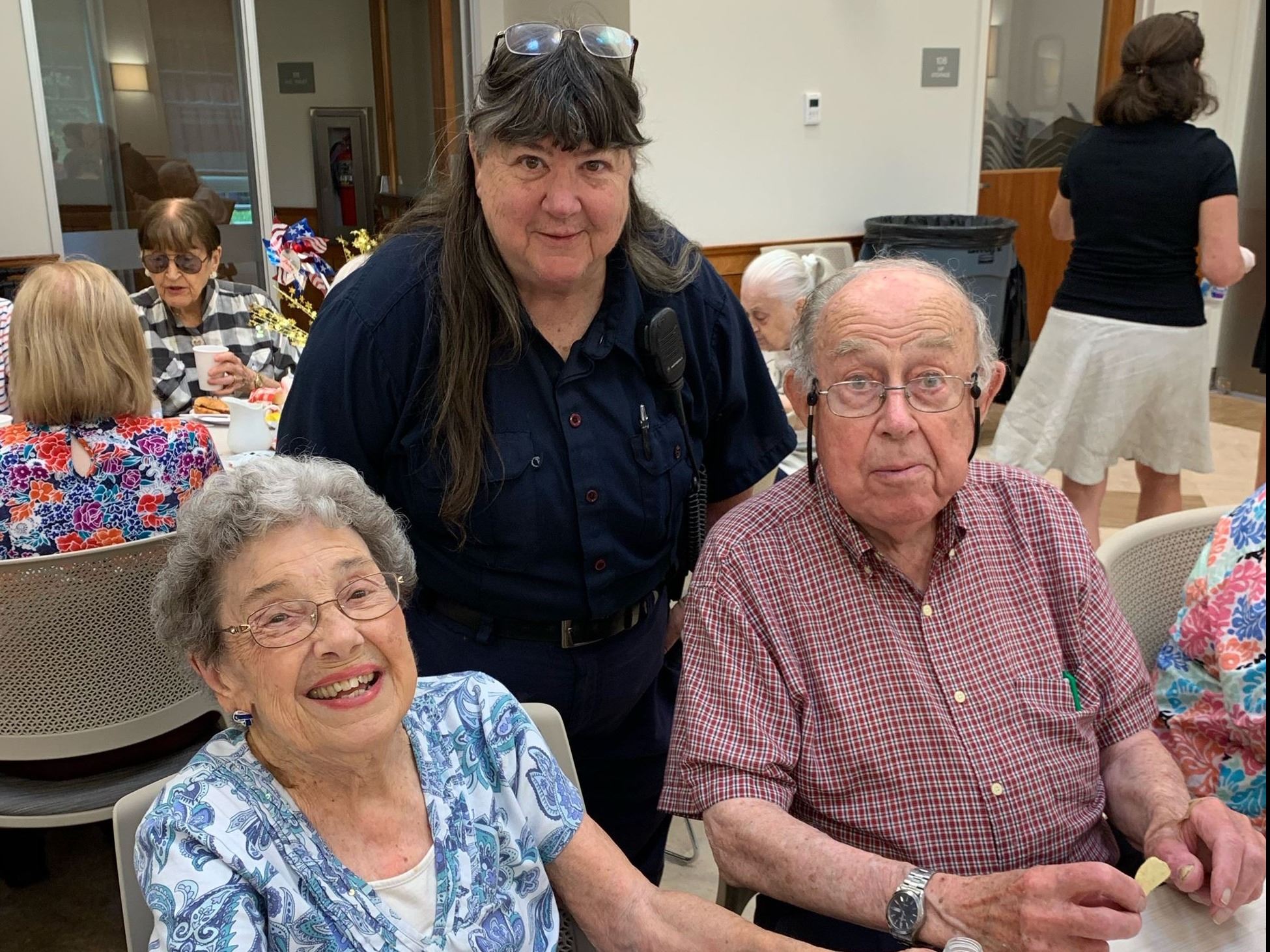 Photo of Dwin and John Schuler and Animal Control officer Sue Webb